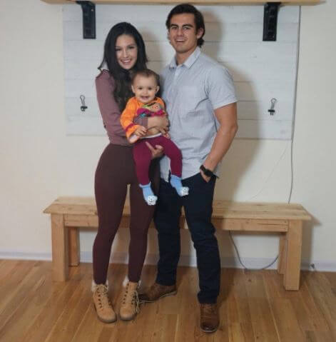 Lauren Gibson's sister, Natalie, with her boyfriend and daughter.